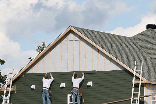 Professional Siding Installation technician working in Brookville, OH